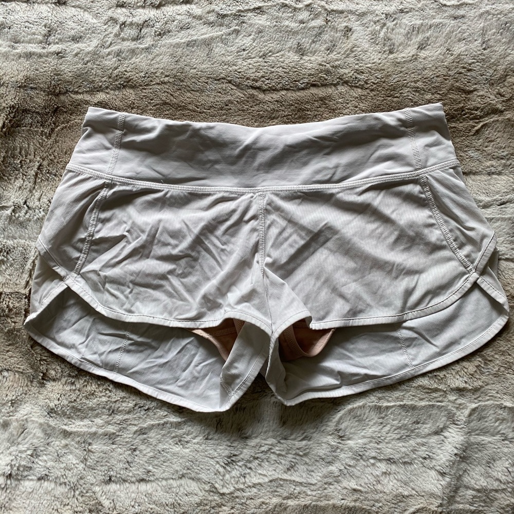 White lululemon running shorts